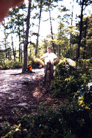 Kirby is instructing a tree stump on how to take a picture.<br>14:00-102.jpg